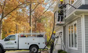 Gutter cleaning for tree-lined homes in Cincinnati, OH by vinyl siding professionals